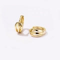Detail of 18K gold-plated geometric hoop earrings with triple-layered hollow bands - Gold