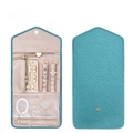 Internal compartments of the foldable quilted jewelry travel organizer in teal and beige - Teal