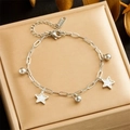 Titanium steel anklet with star charms and beads in jewelry box from top view - Silver Star Bead Style (B1365)