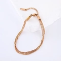 Detailed view of layered rose gold snake chains made of stainless steel with lobster clasp - Rose Gold Bracelet