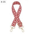 Macro view of red and beige geometric diamond pattern strap with golden metal hooks - Red
