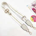 Adjustable beige bag strap with golden chevron embroidery and metallic hardware details - Gold Buckle / White Gold Arrow Strap