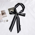 Elegant black silk scarf with white stripes tied in a bow on minimalist background - Black with White Stripes