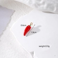 Detail showing red chili pendant dimensions 1.9cm by 0.6cm with gold loop and weight 0.9g - Chili