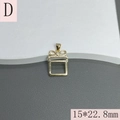 Detailed close-up of a gold gift box charm with zirconia bow, size 15x22.8mm - Gold Bow Gift Box (Style D)