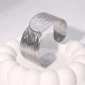 Irregular textured silver open bangle bracelet in stainless steel with water ripple effect - Steel