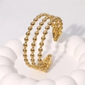 Elegante bracciale rigido aperto a tre strati con perline geometriche dorate da donna - Oro