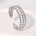 Bracciale rigido multistrato minimalista in acciaio inossidabile argento su vassoio bianco - Color Acciaio