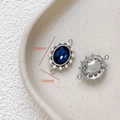Detail of 20mm x 14mm blue gemstone pendant with pearl halo and silver-plated base - 9# White Gold Pearl Deep Blue Zirconia