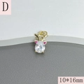 Dettaglio ciondolo alce dorato con zircone a pera e pietre rosa, dimensioni 10x16mm - Testa di Renna