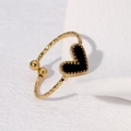Minimalist gold heart ring with black inlay and hammered texture on open band - Black