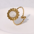 Detail of vintage gold sunflower ring with mother-of-pearl and hammered texture band - Pearl White