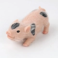 Pink silicone toy pig with black spots and realistic fur texture for sensory stress relief - Printed Spotted Pig with Curly Tail 175g