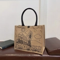 Natural linen tote bag with black woven handles and minimalist rustic line art - House