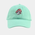 Detailed close-up of mint green baseball cap featuring delicate red mushroom embroidery - Adjustable / Teal