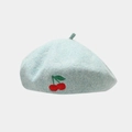 Close-up of light blue wool beret featuring exquisite red cherry embroidery detail - One Size / Light Blue