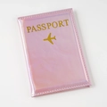 Detailed view of the pink holographic PU leather passport cover with golden text - Pink / 14×10cm