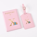 Pink PU leather passport holder and luggage tag set with gold letter X and travel motifs - Pink Letter X