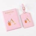 Detail of pink PU leather passport holder and luggage tag set with gold letter A design - Pink Letter A