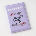 Macro shot of purple PU leather passport cover with limit challenge printed design - Purple