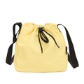 Light yellow casual drawstring bucket bag with black adjustable shoulder strap - Yellow
