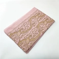 Detailed view of pink cashmere scarf with intricate gold paisley embroidery and tassels - Light Pink