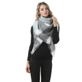 Gray and white plaid cashmere-like scarf with fringe details worn by a model - B16 Grey White Plaid