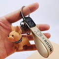 Portachiavi bulldog francese con cinturino in pelle beige e ciondolo marrone - Cachi