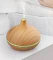 Close-up of wood grain ultrasonic diffuser featuring green LED light and mist outlet - Light Wood Grain / 5V USB