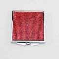 Square silver folding makeup mirror with red rhinestones on a white background - Red