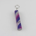 Macro detail of 10ml refillable perfume spray bottle with purple and pink rhinestones - Purple Stripe