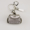 Llavero de bolso con diamantes de imitación, borla blanca y cierre de mosquetón plateado - Blanco