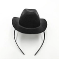 Top-down view of a black mini felt cowboy hat headband for party and event decor - Denim / Black