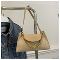 Detail shot of beige corduroy underarm bag with gold chain and smooth PU leather flap - Khaki