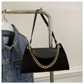 Detail of black corduroy shoulder bag with gold chain and leather flap on a hanger - Black