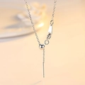 Adjustable silver chain necklace detail featuring polished slider bead and lobster clasp - Steel