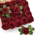Detail view of deep red artificial foam roses in a gift box with stems and green leaves - Dyed Wine Red