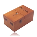 Brown wooden Useless Box with Marry Me text and metal toggle switch on white background - Dark Wood (Marry Me)