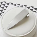 Minimalist silver duckbill hair clip with brushed metal texture on a white jewelry plate - Minimalist Metal / Waterdrop Clip Silver