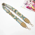 Detail of adjustable woven wide shoulder strap with geometric pattern and gold buckles - Khaki Green Diamond - Gold Buckle