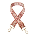 Close-up of ethnic style wide guitar strap with red geometric floral embroidery on beige fabric - Red on Beige Base