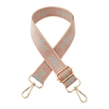 Detail of pink ethnic embroidered purse strap with golden hooks and floral patterns - Pink and Blue on Beige Base