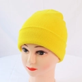 Detail of bright yellow knit beanie showing the ribbed texture and wide cuffed brim design - One Size / Light Yellow