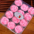 Set mit 12 romantischen Teelichtern in Rosenform in einer Klarsichtbox als Geschenk - Rosa