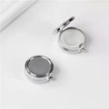 Silver round metal pill box with three compartments shown in open and closed views - 35mm Round Single-Grid