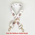 Close-up of hot air balloon print bag strap with golden metal hooks and Journey text - Hot Air Balloon Pattern / Gold Hooks