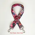 Detail view of woven floral bag strap in pink with adjustable silver metal hooks - Pink Floral / Silver Hooks