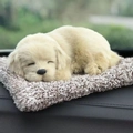 Detailed close-up of a realistic plush puppy sleeping on a soft brown and white faux fur mat - Large Yellow Labrador Dog