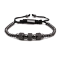 Close-up of gun-black beaded bracelet with zircon cylinders and adjustable woven cord - Gunmetal