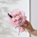 Close-up of pink soap rose bouquet with "Just for you" ribbon and paper wrap - 7 Roses / Pink